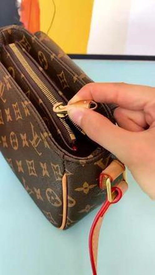 巧用拉链头修复衣包拉链故障